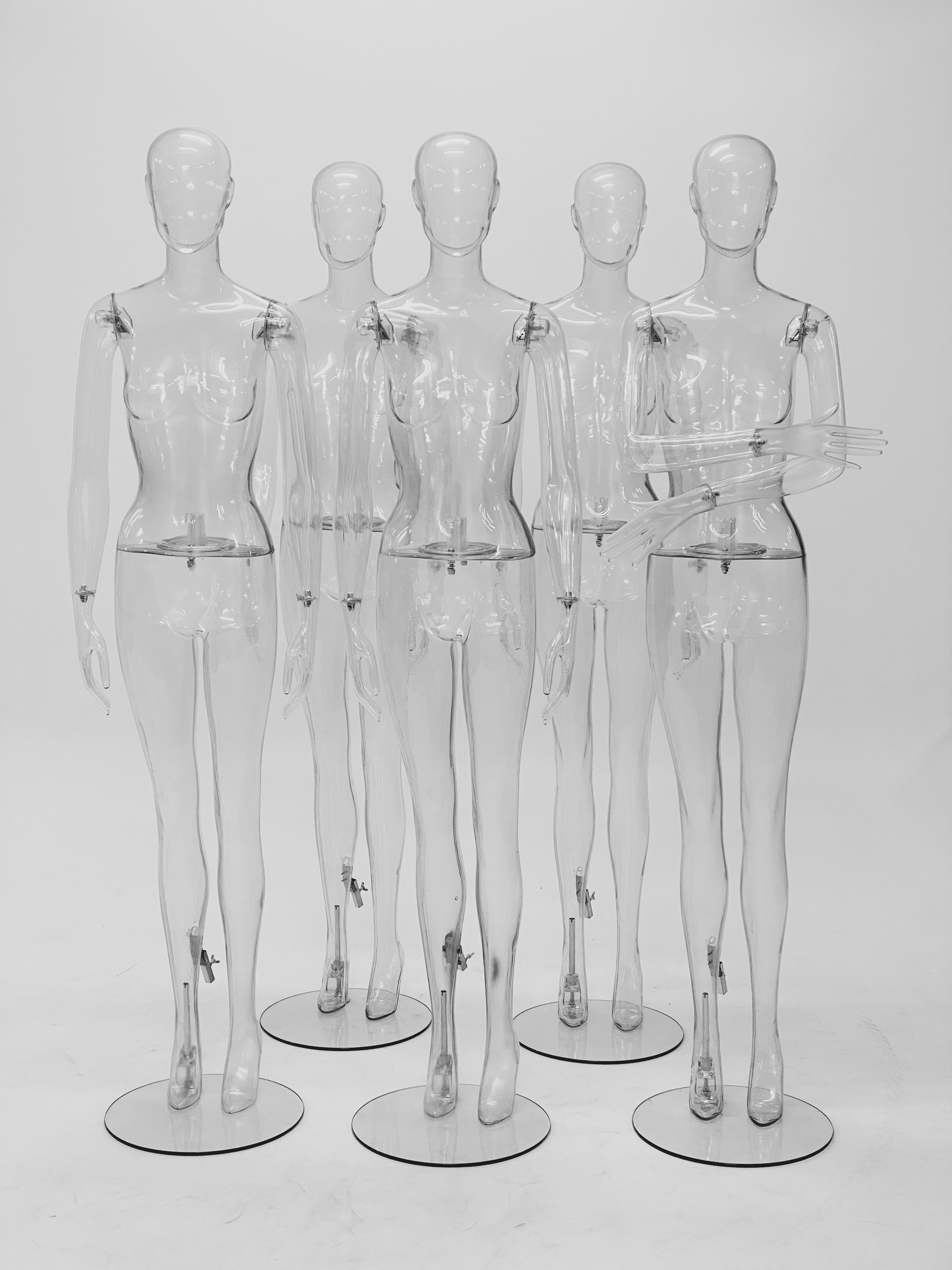 Transparent female mannequins.